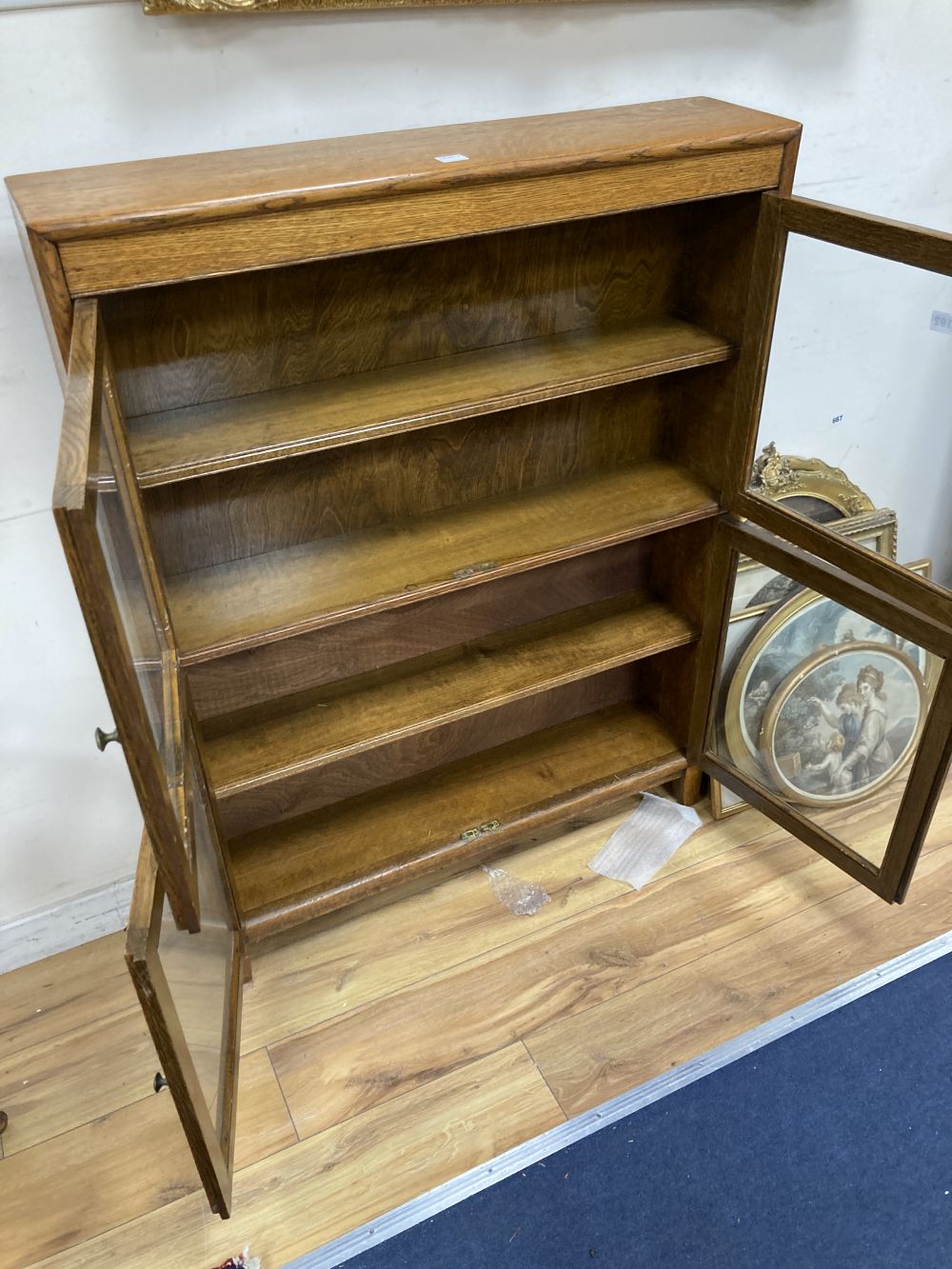 A Minty glazed oak two section bookcase, width 87cm depth 19cm height 113cm